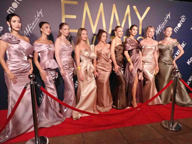 Emmys main Models pose on the red carpet during the Emmy Awards after-party at Level 8 in Downtown Los Angeles. Photo credit: Lan Bui